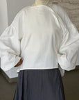 Blouse à col courbé — Blanc