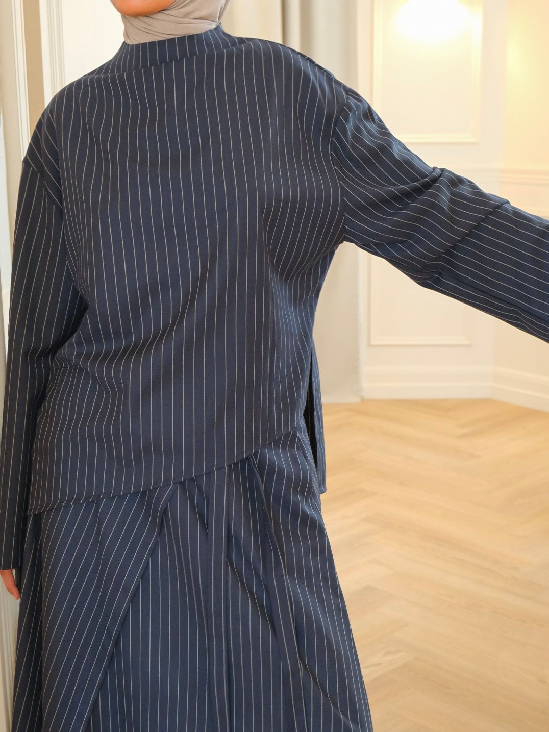 Top asymétrique rayé