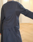 Top asymétrique rayé